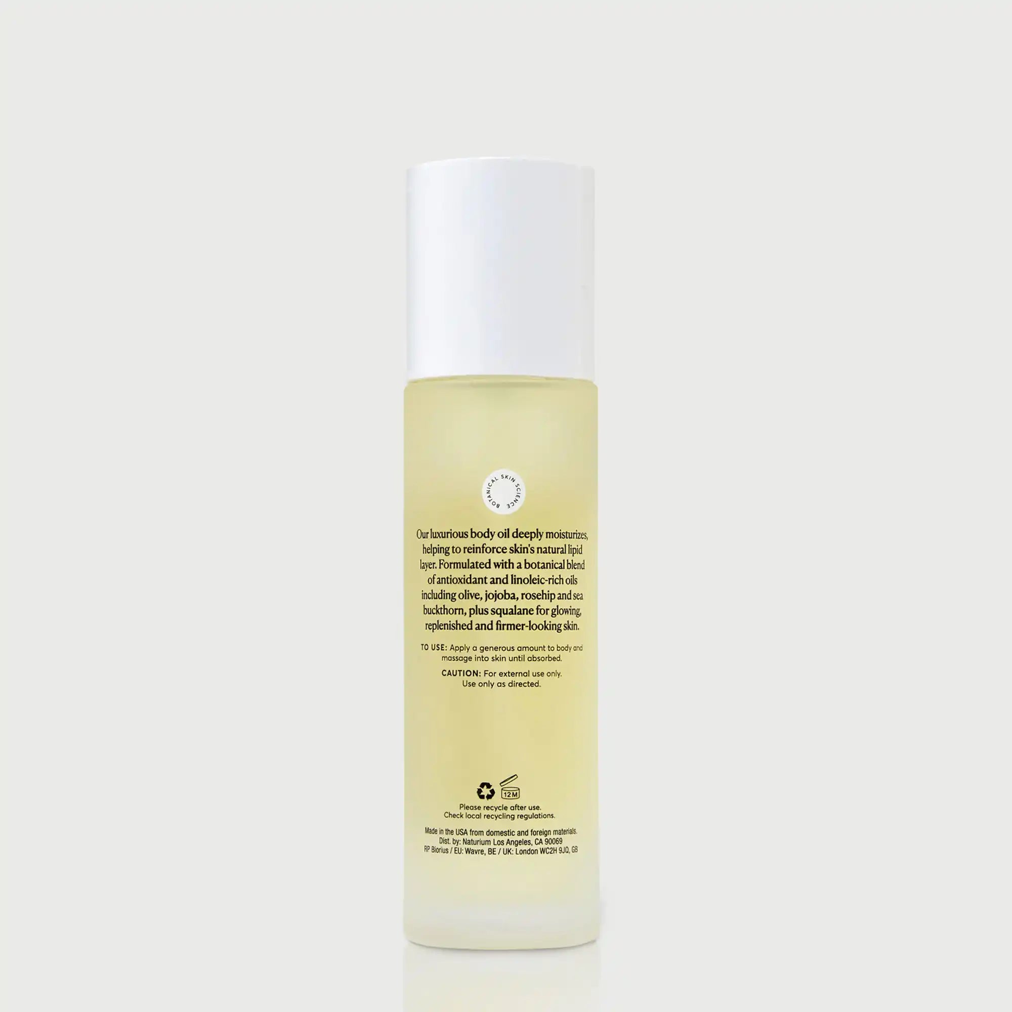 NATR-10115-The-Glow-Getter-Body-Oil-bonebkgd-Back-CapOn.jpg